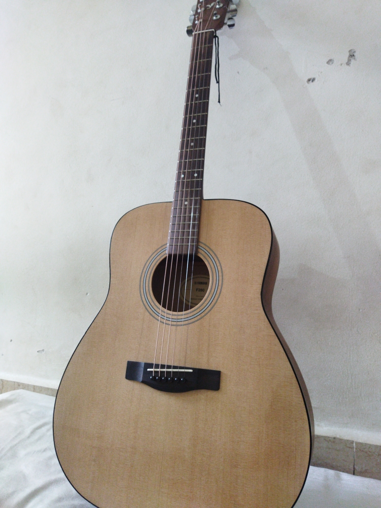 Buy Used 'Yamaha F280 40inch acoustic With Strap, Guitar Bag, Polishing